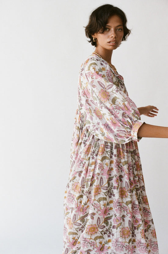 Daughters of India Kyra Maxi Dress in Fuchsia Bloom — studio side profile, billowed sleeve and gathered waist detail