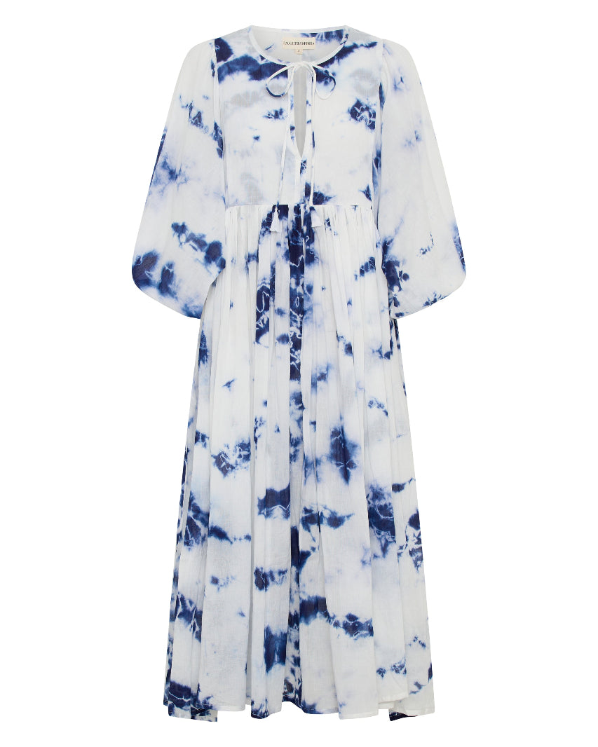 Kyra Midi Dress Deep Sea — ghost mannequin full length front view, deep sea shibori tie-dye cotton midi dress with V-neckline tie, balloon sleeves and tiered skirt, white background | Daughters of India